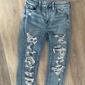 American Eagle Stretch Jeans, Distressed, Womans size 6, medium Wash